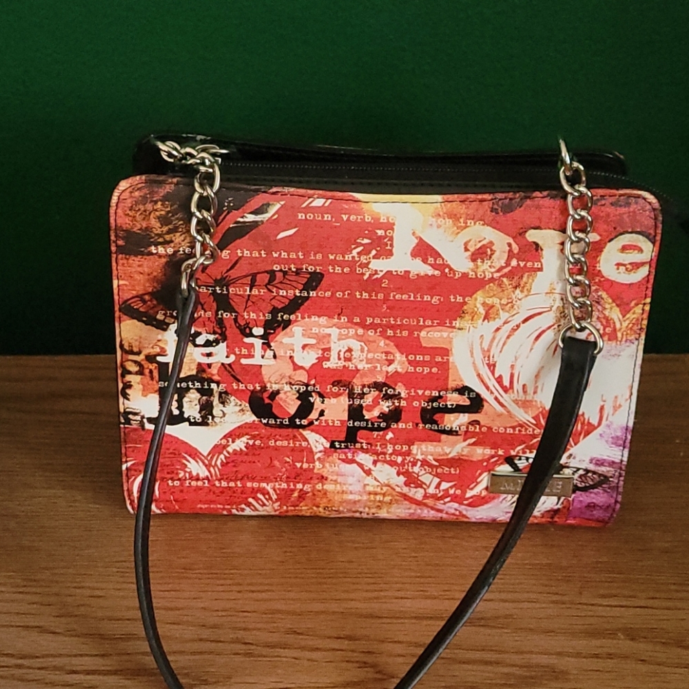 USED MICHE PURSE WITH  FOUR  SHELL